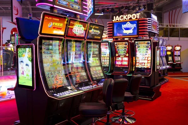 Live Sakong dealer managing a multi-player card game with camera feeds